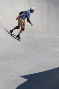 Full length of man skateboarding on skateboard