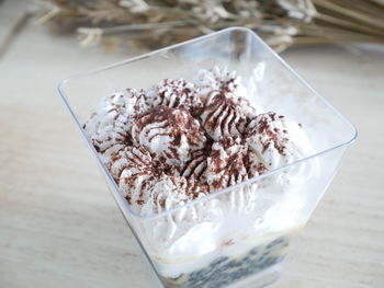 Ice cream in glass on table