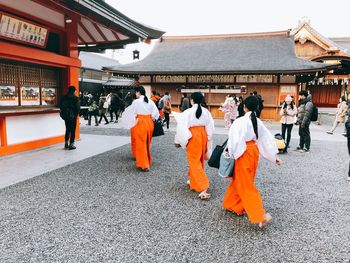 Group of people walking in city