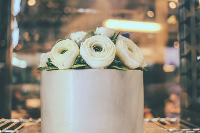 Close-up of white rose on table