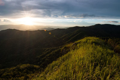 Scenic view of landscape against sky during sunset