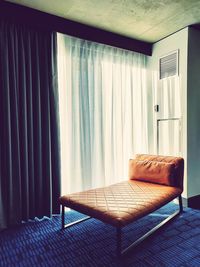 Empty chair on table at home