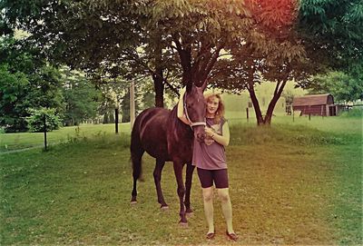 Full length of woman standing on grass