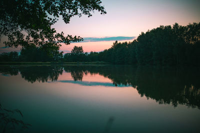 Scenic view of lake against sky during sunset