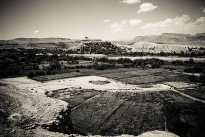 View of landscape against cloudy sky