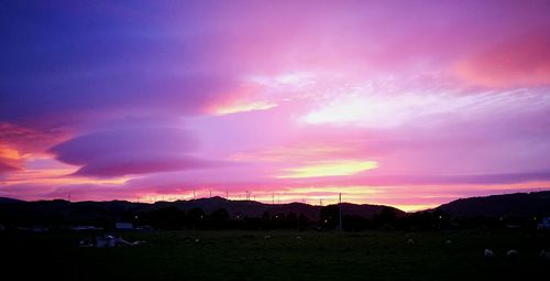 Scenic view of silhouette landscape against sky during sunset