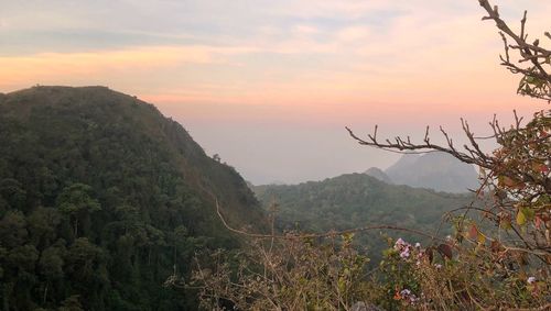 Scenic view of mountains against sky during sunset