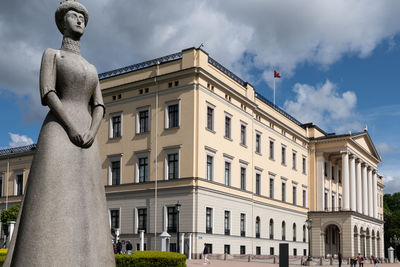 Low angle view of statue against sky