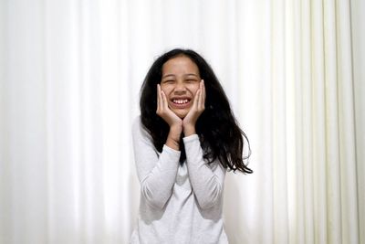 Portrait of a smiling young woman