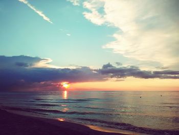 Scenic view of sea at sunset