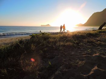 Scenic view of sea at sunset