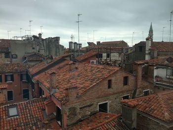 High angle view of buildings in city against sky