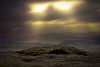 Scenic view of landscape against sky during sunset