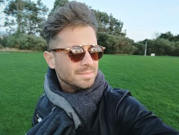 Portrait of young man wearing sunglasses