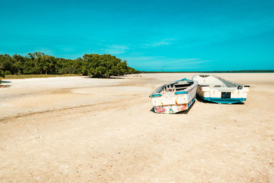 Scenic view of a fishing boat at mida creek in watamu during low tide, malindi in kenya