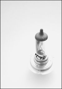Close-up of chess pieces against white background