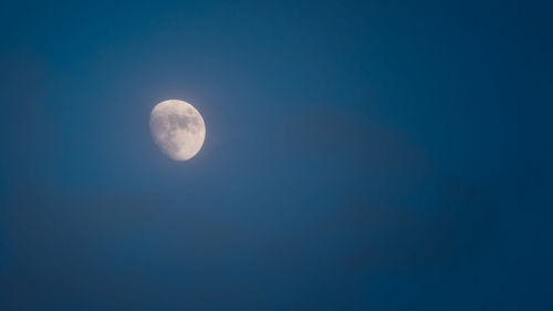 Low angle view of moon in sky