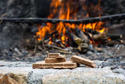 Close-up of firewood on wood