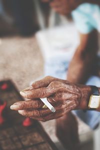 Close-up of hand holding hands