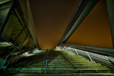 Low angle view of staircase against sky at night