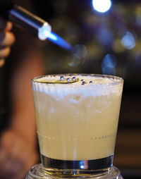 Close-up of coffee in glass on table