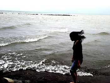 Man standing on beach