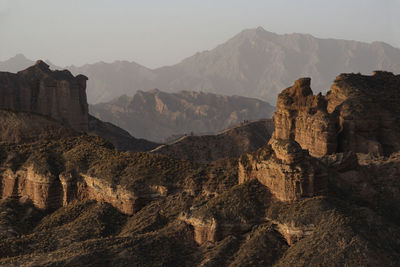 Aerial view of rocky landscape against sky