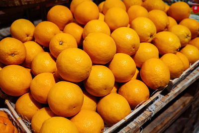 Close-up of lemons for sale at market stall