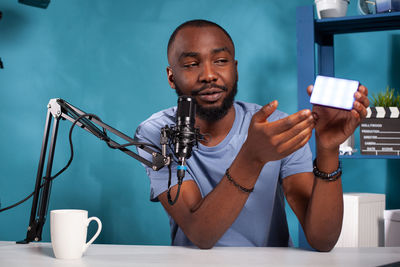 Young man using mobile phone