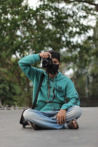 Man photographing with camera