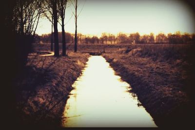 Scenic view of landscape at sunset