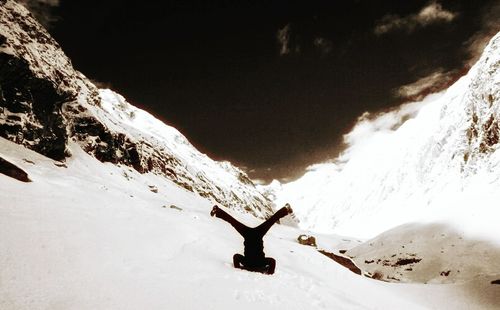 Man on snow covered landscape