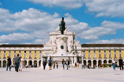 Tourists visiting famous monuments and buildings