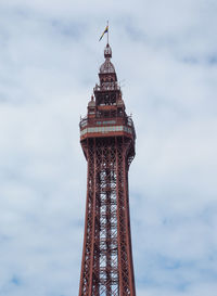 Low angle view of tower against sky in city