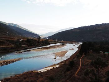 River and mountains against sky