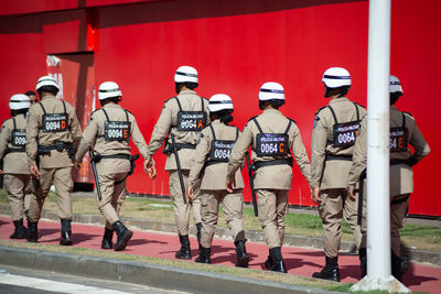  military police officers from bahia are seen walking around during fuzue's presentation 