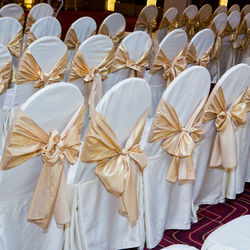 High angle view of arranged empty chairs indoors