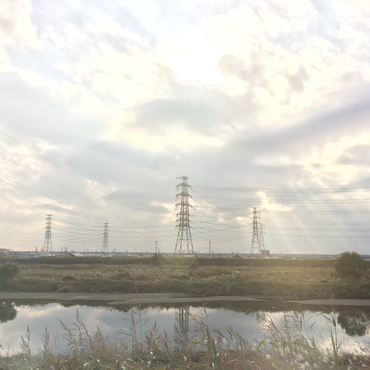 electricity pylon, sky, electricity, power supply, power line, fuel and power generation, connection, cloud - sky, technology, tree, cable, nature, field, no people, scenics, outdoors, sunset, electricity tower, beauty in nature, day