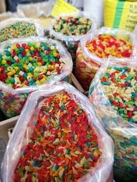 Close-up of colorful candies for sale at market stall