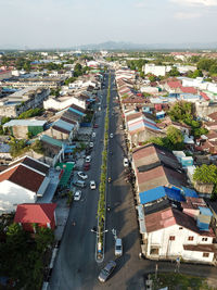 High angle view of street amidst buildings in city