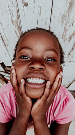 Portrait of young child with eyes closed