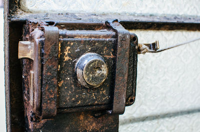 Close-up of old rusty metal door