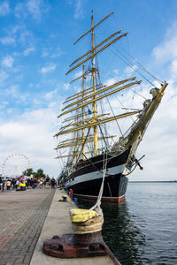 Ship in water against sky