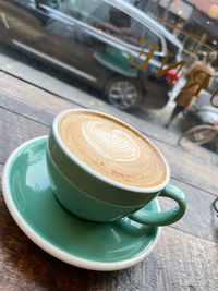 Close-up of coffee served on table