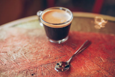 Close-up of coffee cup on table