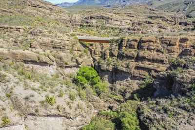 High angle view of rocky mountains, hill, river and canyon 