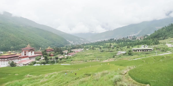 Scenic view of landscape against mountain range