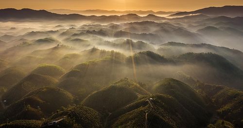 Panoramic view of mountains against sky during sunset