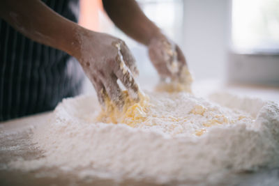 Close-up of person preparing food