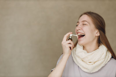 Young woman drinking water